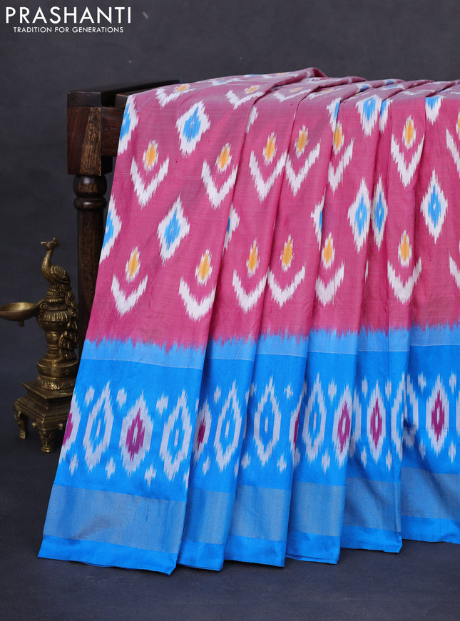 Pochampally silk saree pink and cs blue with allover ikat butta weaves and long ikat woven zari border