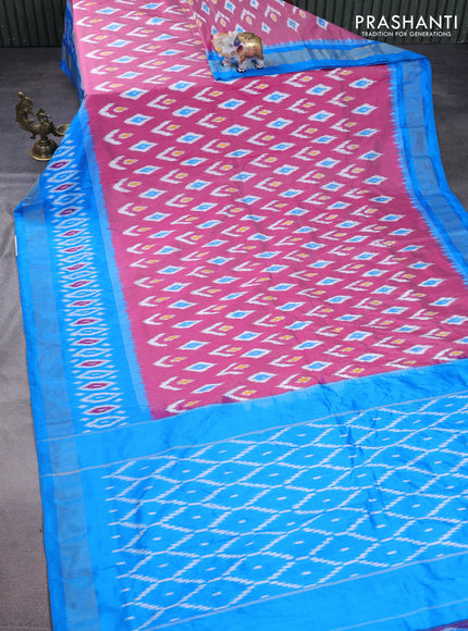 Pochampally silk saree pink and cs blue with allover ikat butta weaves and long ikat woven zari border