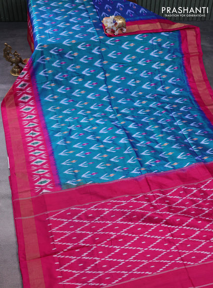 Pochampally silk saree dual shade of teal green and magenta pink with allover ikat butta weaves and long ikat woven zari border