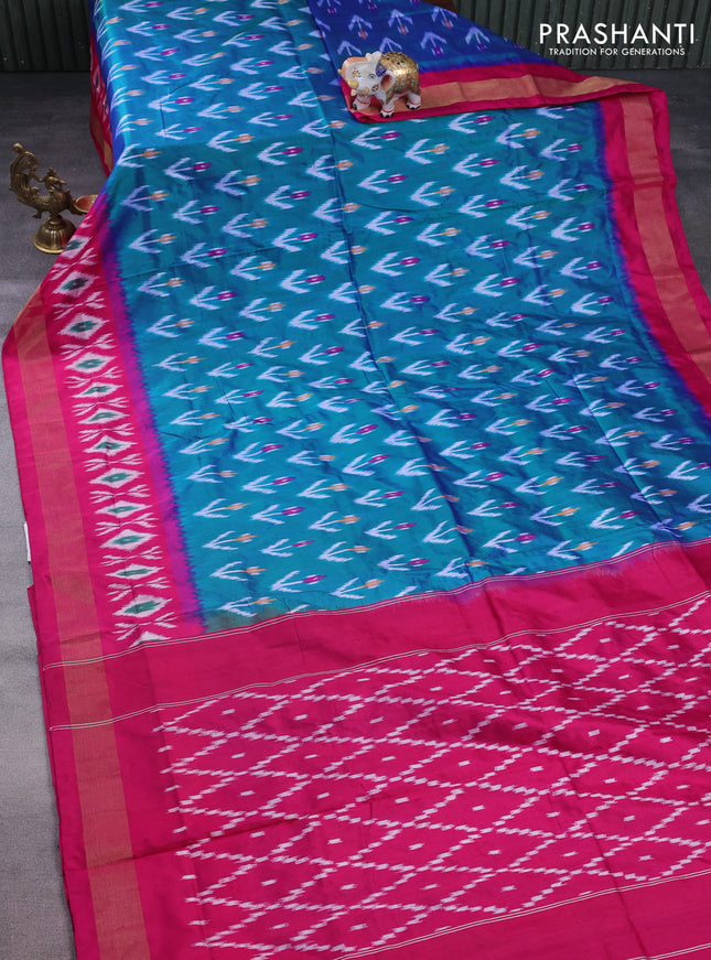 Pochampally silk saree dual shade of teal green and magenta pink with allover ikat butta weaves and long ikat woven zari border