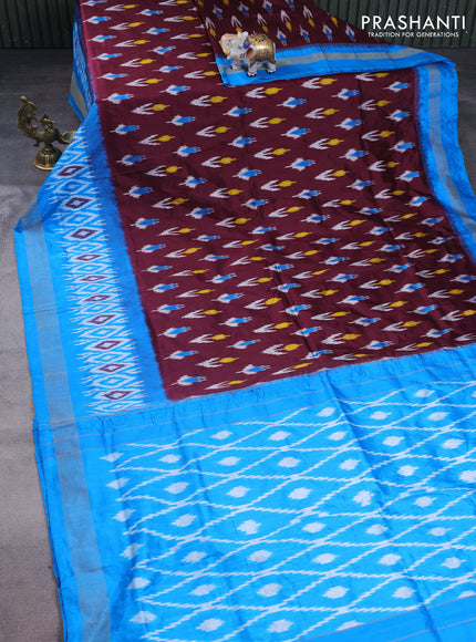 Pochampally silk saree deep maroon and cs blue with allover ikat butta weaves and long ikat woven zari border