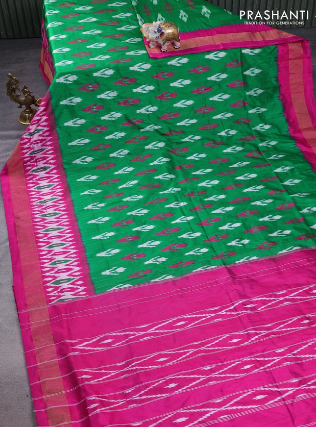 Pochampally silk saree greem and magenta pink with allover ikat butta weaves and long ikat woven zari border