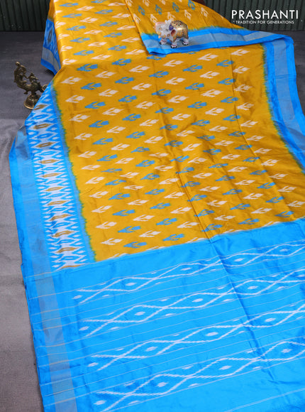 Pochampally silk saree mustard yellow and cs blue with allover ikat butta weaves and long ikat woven zari border