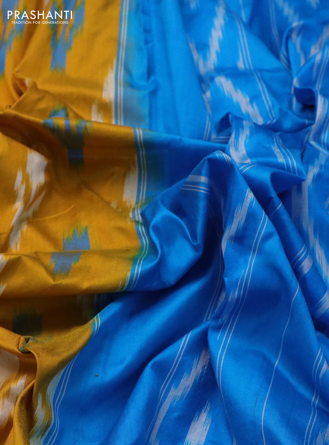 Pochampally silk saree mustard yellow and cs blue with allover ikat butta weaves and long ikat woven zari border