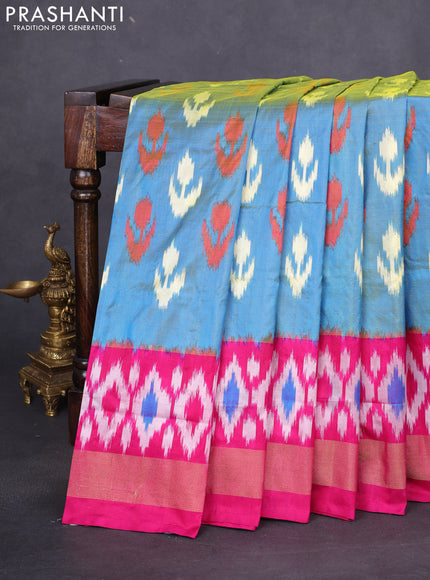 Pochampally silk saree dual shade of blue and magenta pink with allover ikat butta weaves and long ikat woven zari border