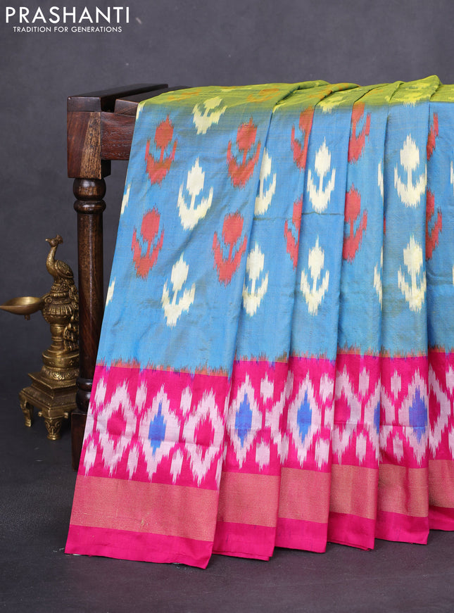 Pochampally silk saree dual shade of blue and magenta pink with allover ikat butta weaves and long ikat woven zari border