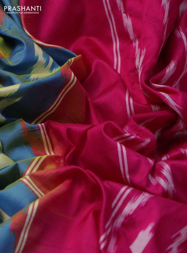 Pochampally silk saree dual shade of blue and magenta pink with allover ikat butta weaves and long ikat woven zari border