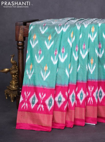 Pochampally silk saree green and dark pink with allover ikat butta weaves and long ikat woven zari border