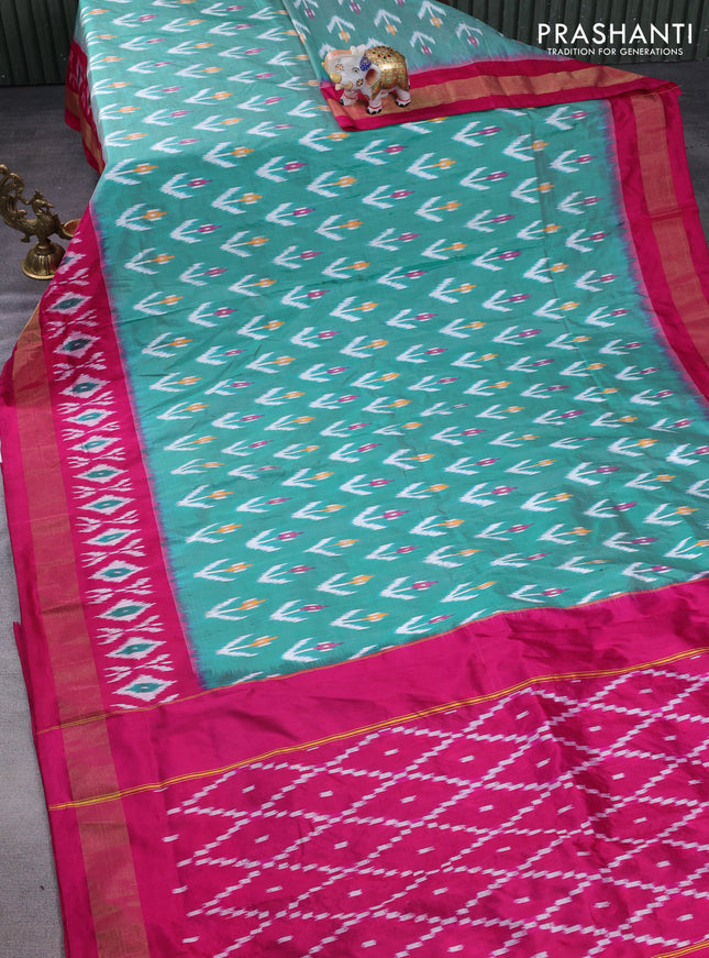Pochampally silk saree green and dark pink with allover ikat butta weaves and long ikat woven zari border