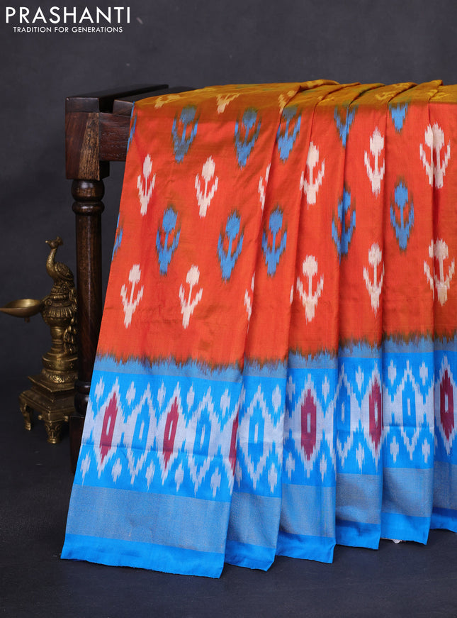 Pochampally silk saree dark mustard and cs blue with allover ikat butta weaves and long ikat woven zari border