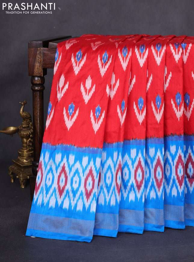 Pochampally silk saree red and cs blue with allover ikat weaves and long ikat woven zari border