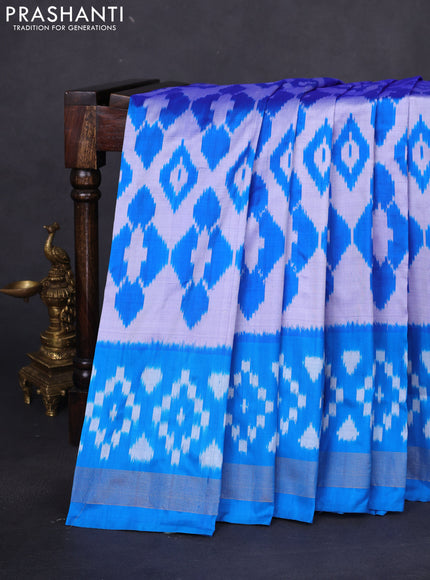 Pochampally silk saree dual shade of mild lavender and cs blue with allover ikat weaves and long ikat woven zari border