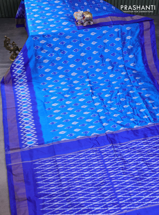 Pochampally silk saree cs blue and blue with allover ikat butta weaves and ikat woven zari border