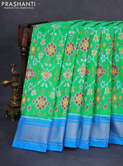 Pochampally silk saree green and cs blue with allover ikat weaves and zari woven border
