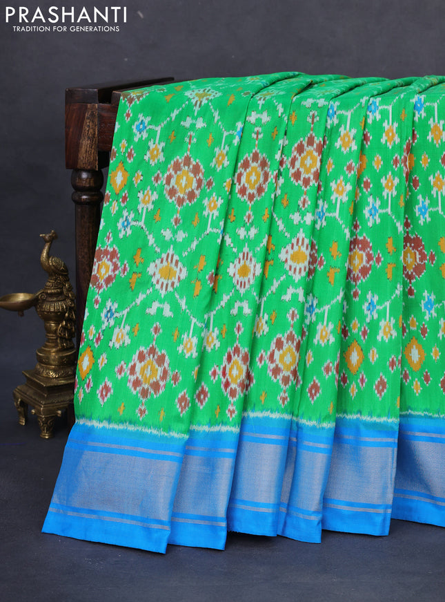 Pochampally silk saree green and cs blue with allover ikat weaves and zari woven border
