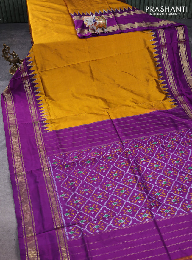 Pochampally silk saree dark mustard and purple with plain body and temple design rettapet zari woven border