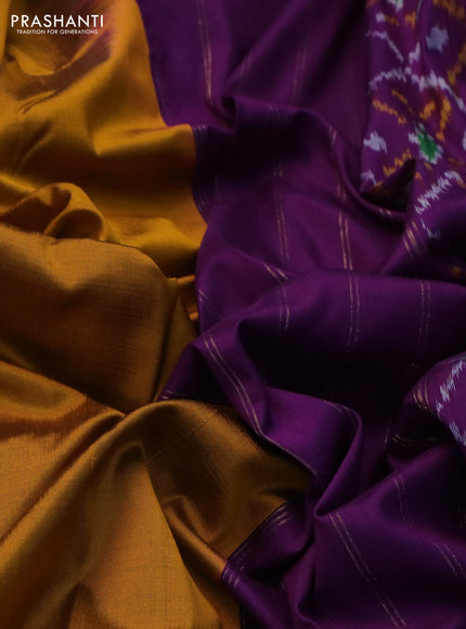 Pochampally silk saree dark mustard and purple with plain body and temple design rettapet zari woven border