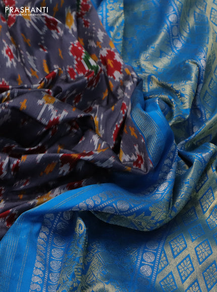 Pochampally silk saree grey and cs blue with allover ikat weaves and long silver & gold zari woven border
