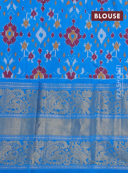 Pochampally silk saree grey and cs blue with allover ikat weaves and long silver & gold zari woven border