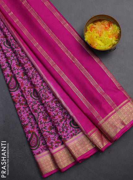 Semi mysore silk saree light pink and pink with allover prints and zari woven border