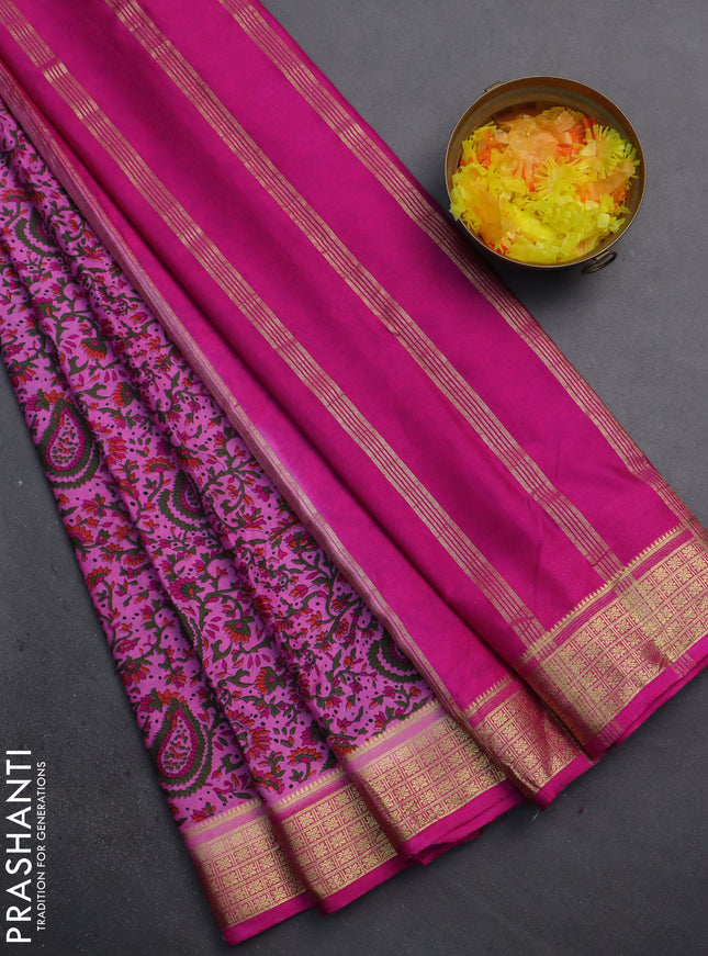 Semi mysore silk saree light pink and pink with allover prints and zari woven border