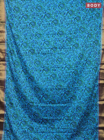 Semi mysore silk saree light blue and navy blue with allover prints and zari woven border