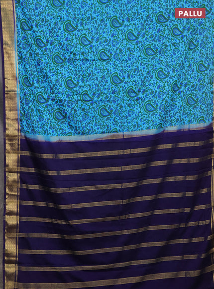 Semi mysore silk saree light blue and navy blue with allover prints and zari woven border