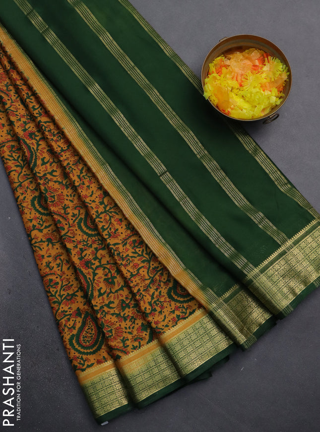 Semi mysore silk saree mustard yellow and green with allover prints and zari woven border