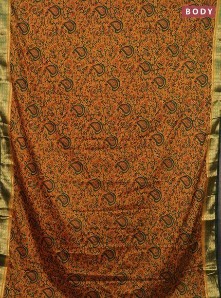 Semi mysore silk saree mustard yellow and green with allover prints and zari woven border
