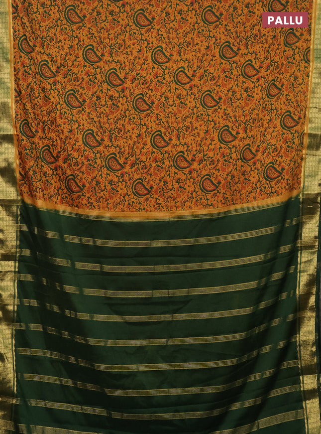 Semi mysore silk saree mustard yellow and green with allover prints and zari woven border