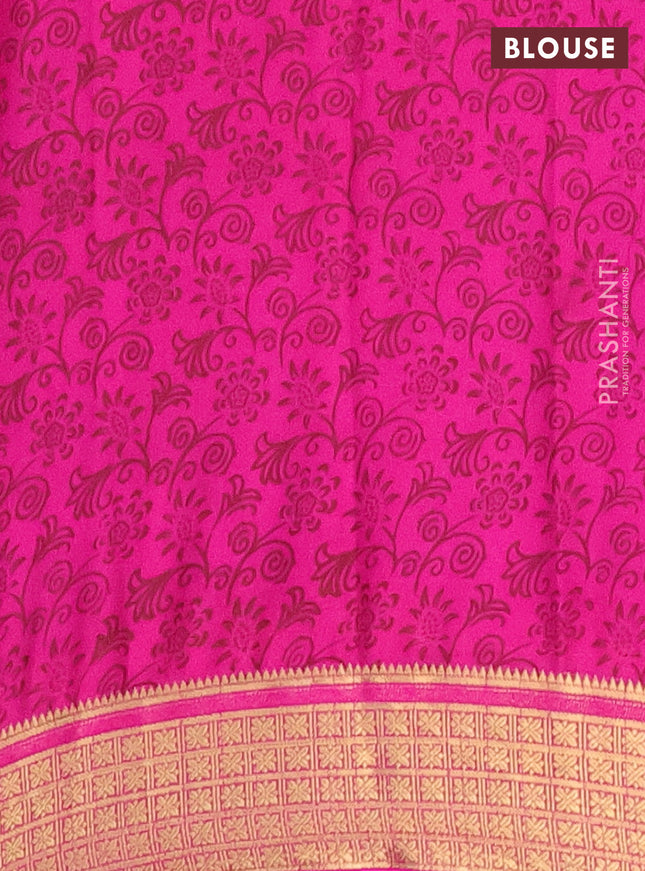 Semi mysore silk saree light pink and pink with allover prints and zari woven border
