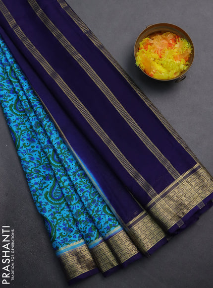 Semi mysore silk saree light blue and navy blue with allover prints and zari woven border