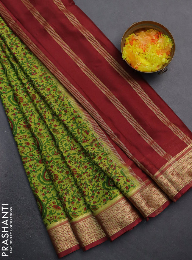 Semi mysore silk saree light green and maroon with allover prints and zari woven border