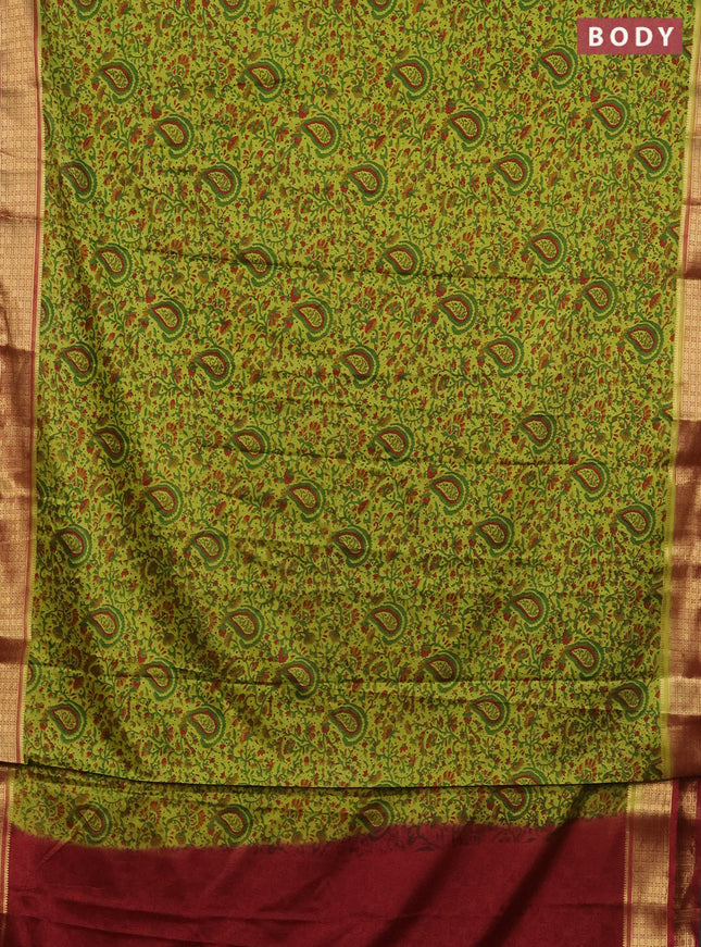 Semi mysore silk saree light green and maroon with allover prints and zari woven border
