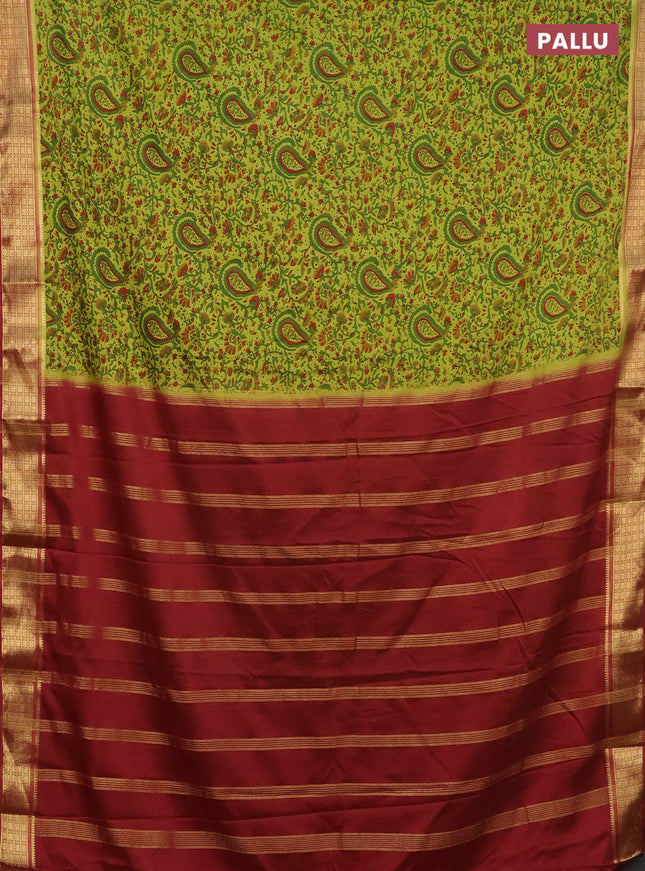 Semi mysore silk saree light green and maroon with allover prints and zari woven border