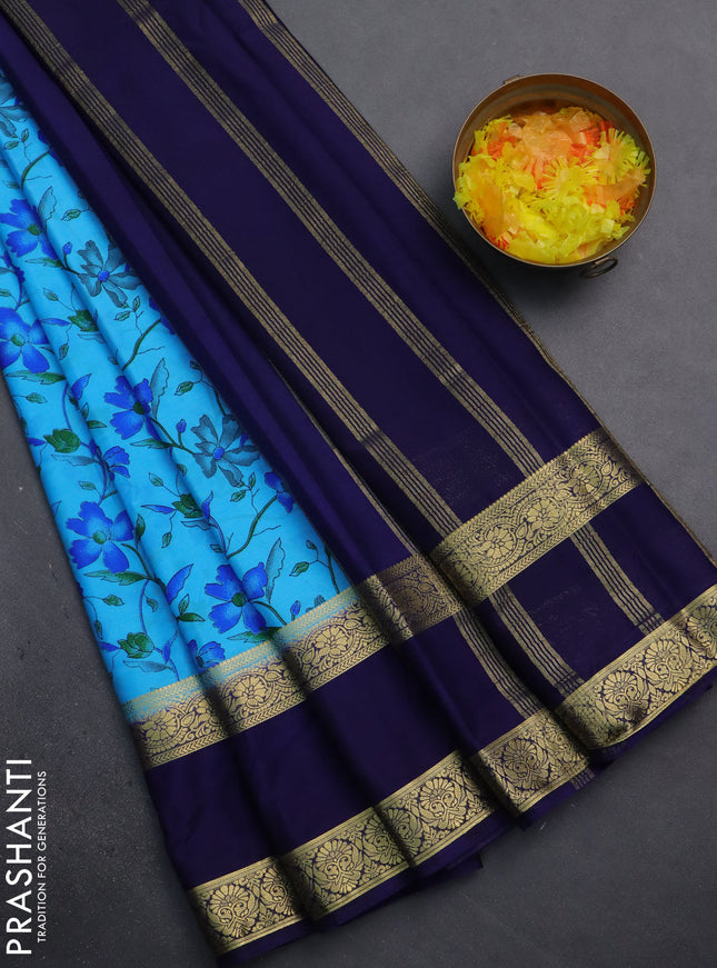 Semi mysore silk saree light blue and navy blue with allover floral prints and rettapet zari woven border