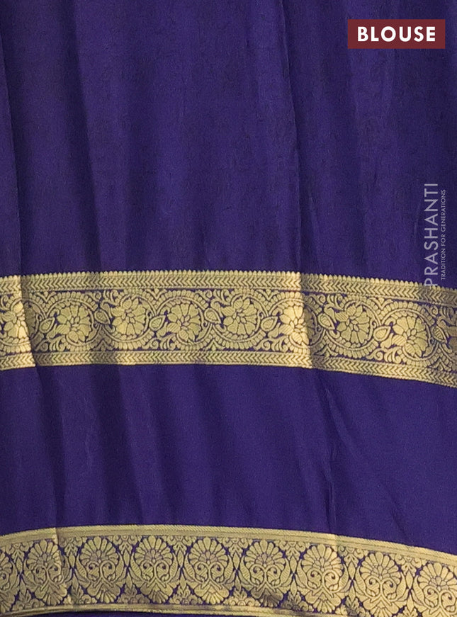 Semi mysore silk saree light blue and navy blue with allover floral prints and rettapet zari woven border