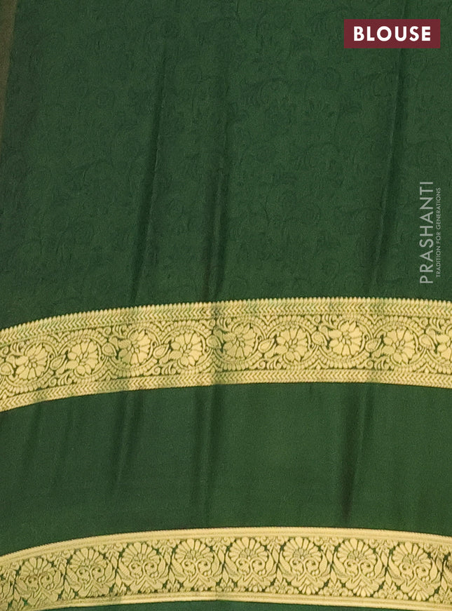 Semi mysore silk saree mustard yellow and green with allover floral prints and rettapet zari woven border