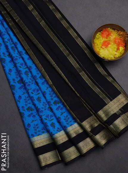 Semi mysore silk saree blue and black with allover prints and rettapet zari woven border
