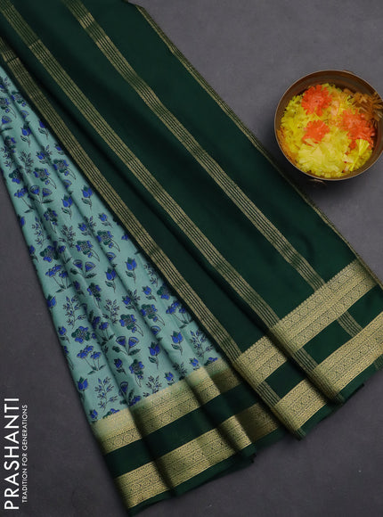 Semi mysore silk saree pastel blue shade and bottle green with allover prints and rettapet zari woven border