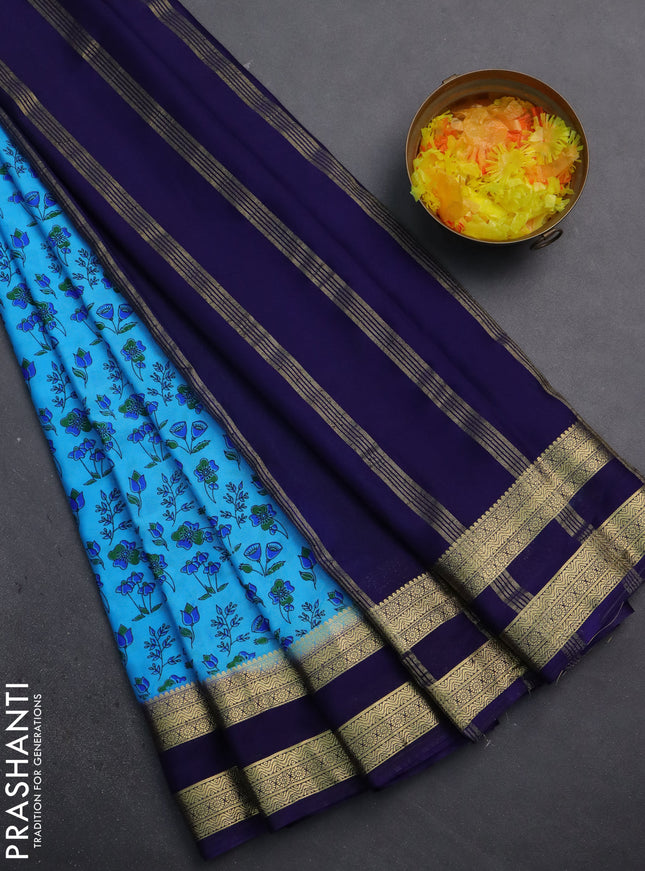 Semi mysore silk saree light blue and navy blue with allover prints and rettapet zari woven border