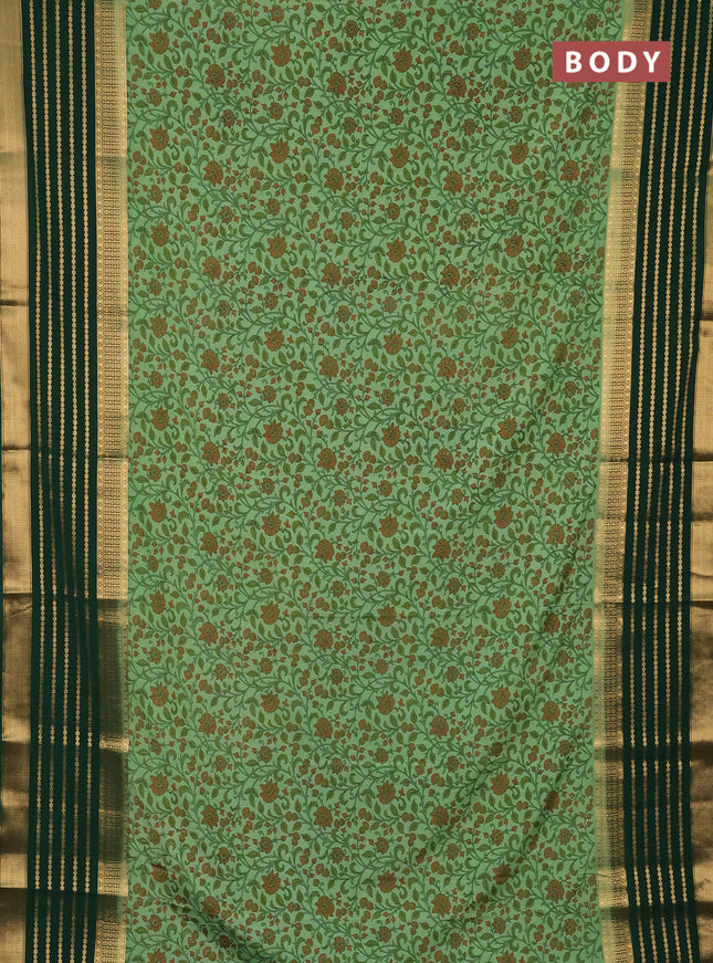 Semi mysore silk saree pastel green and green with allover kalamkari prints and long zari woven border