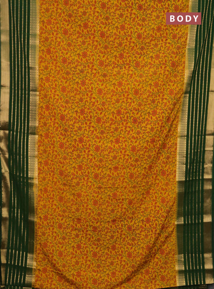 Semi mysore silk saree yellow and green with allover kalamkari prints and long zari woven border
