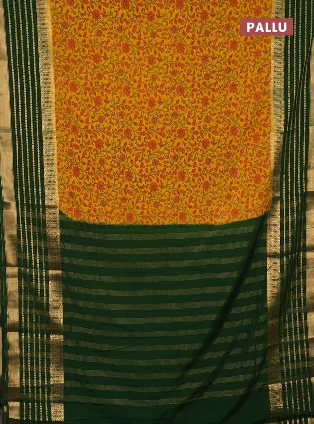 Semi mysore silk saree yellow and green with allover kalamkari prints and long zari woven border