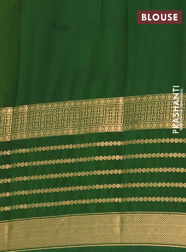 Semi mysore silk saree yellow and green with allover kalamkari prints and long zari woven border