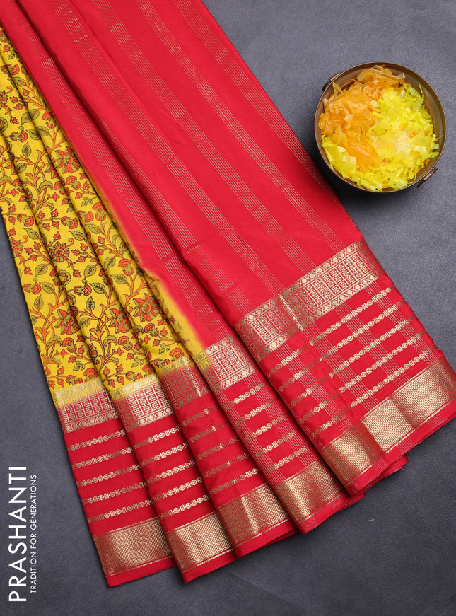 Semi mysore silk saree yellow and red with allover kalamkari prints and long zari woven border