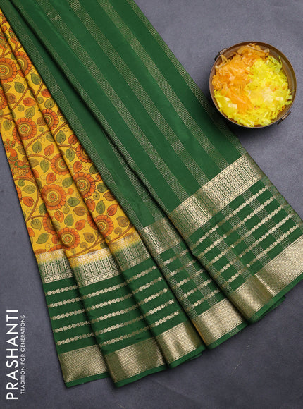 Semi mysore silk saree yellow and green with allover kalamkari prints and long zari woven border