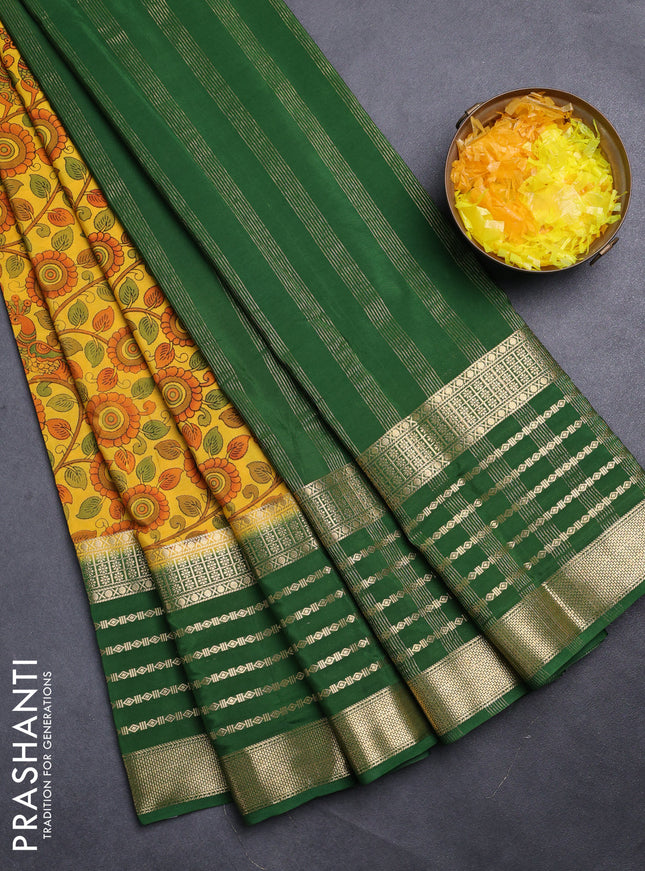 Semi mysore silk saree yellow and green with allover kalamkari prints and long zari woven border
