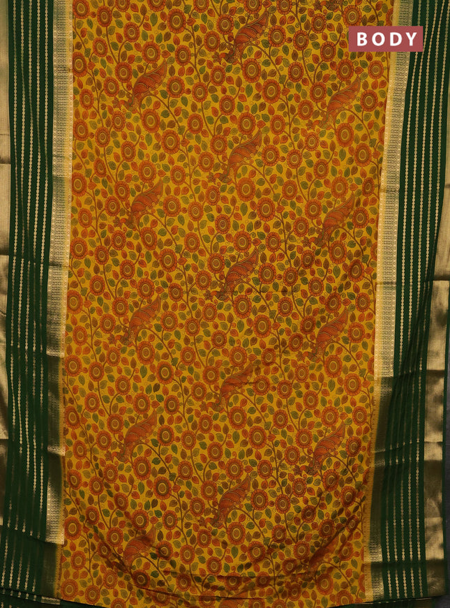 Semi mysore silk saree yellow and green with allover kalamkari prints and long zari woven border