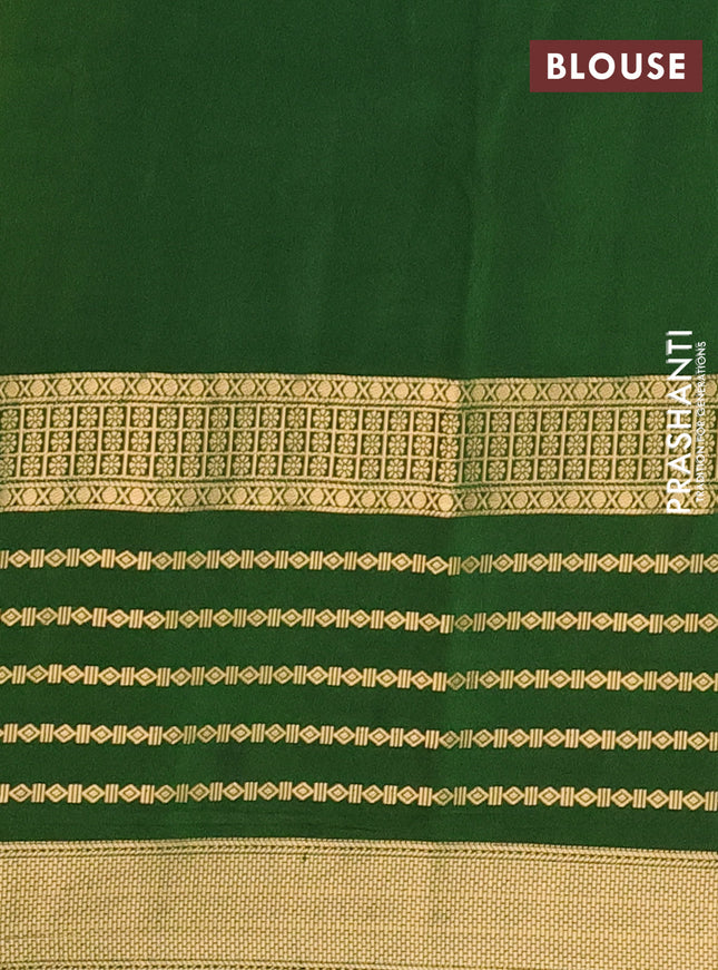 Semi mysore silk saree yellow and green with allover kalamkari prints and long zari woven border